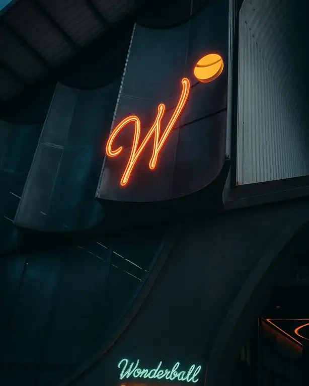 Neon W sign at night