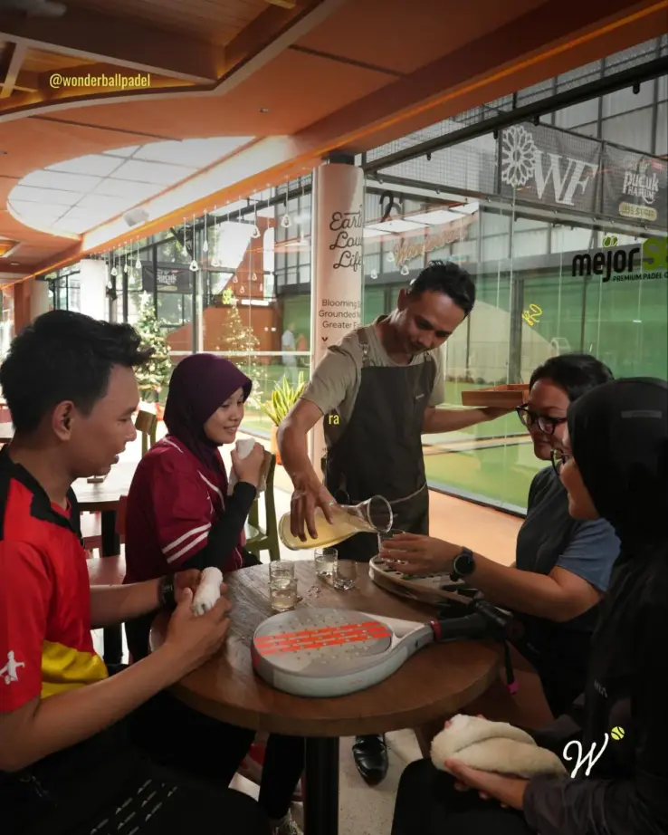 Friends sharing food at the café